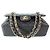 Chanel Piccola borsa a tracolla Classic in caviar nero con catena e finiture dorate - vista 3