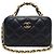 Vanity Chanel Mini bolsa de cosméticos de pele de cordeiro preta com alça de mão e corrente dourada com chip Preto