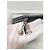 Chanel Clutch Classic in Agnello Nero con Charm Rocket Argentato Large - vista 5