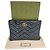 Gucci Clutch Black GG Marmont in pelle matelassé lucida Nero