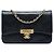 Wallet On Chain Cartera con cadena Chanel en piel de cabra negra con costuras y CC dorado Negro