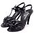 Chanel Scarpe con cinturino da donna in pelle nera con camelia CC Nero - vista 3