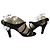Chanel Sandali con cinturino in pelle trapuntata nera Marrone Nero