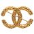 Spilla Vintage Chanel Coco Mark Motivo Lava D'oro