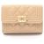 Cartera tríptico Boy de Chanel en beige