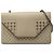 Borsa a tracolla Betty in pelle beige con borchie Mini di Saint Laurent