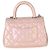 Borsa Chanel Mini Coco Top Handle Flap in Caviar Trapuntato Iridescente Rosa Chiaro Metallico - vista 2