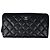 Cartera larga Chanel en piel de becerro granulada negra Negro
