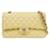 Chanel Borsa a tracolla Classic Medium in caviar iridescente giallo