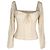 Top Isadora de Reformation en viscosa beige