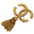 Broche Chanel Gold CC plaqué or à pompon et franges Lava Doré