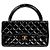 Chanel Tote Bag mit Tragegriff aus schwarzem Lackleder