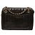 Borsa a tracolla Chanel CC Vertical Quilt in pelle d'agnello nera con medaglione Nero