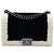 Borsa a tracolla Chanel Boy Flap Bicolor in shearling Old Medium Nera Nero
