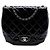 Borsa a tracolla Chanel Medium Quilted Patent Bubble CC Flap nera Nero