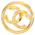 Spilla rotonda Chanel CC placcata oro D'oro