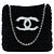 Borsa muffola Chanel CC in shearling nero