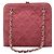 Bolsa Chanel CC em camurça acolchoada rosa com fecho kiss lock