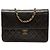 Borsa a tracolla Chanel Medium CC in agnello trapuntato nero