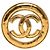 Broche redonda calada Chanel CC chapada en oro Dorado