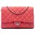 Clutch Chanel trapuntata in caviar rosa con borsa a tracolla con catena