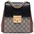Padlock Zaino Gucci GG Supreme con lucchetto beige