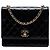 Borsa a tracolla Chanel CC trapuntata in vernice nera Nero