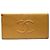 Chanel Bi-Fold Wallet aus genarbtem Kalbsleder Beige