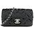 Borsa a tracolla Chanel 65050 in pelle smaltata nera Nero