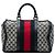 Bolso Boston Gucci Joy mediano en lona GG beige con banda Web