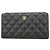 Cartera larga Chanel Matelassé Negro