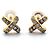 Orecchini Tiffany & Co. in oro giallo 18K con diamanti a forma di croce