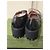 Gucci Plateauslipper aus schwarzem Leder mit GG-Monogramm - Ansicht 3