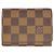 Tarjetero Louis Vuitton Damier Ebene Castaño