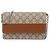 Gucci Portafoglio con catena e emblema Marrone