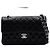 Chanel Borsa a tracolla Classic Small Flap CC in pelle caviar nera con catena argentata Nero