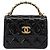Clutch com corrente Chanel em couro patente com alça superior trançada e aba CC Preto
