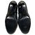 Botas de cano curto Chanel em couro preto com borda recortada e bico acolchoado - vista 6