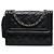 Black Chanel gesteppte Lammleder Schultertasche mit Quaste Schwarz