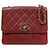Chanel Bolsa de ombro de pele de cordeiro acolchoada com aba e corrente vermelha Vermelho