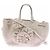 Ulla Johnson Gio Handtasche aus Raffia mit Blumenmuster