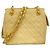 Borsa a tracolla Chanel Matelassé con catena Beige