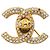 Spilla Chanel placcata oro con strass D'oro