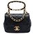 Chanel Mini Borsa a Patta in Lambskin Matelassé Nero con Logo Oval e Manico a Catena