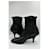 Botas de cano curto em couro preto de bico fino Prada  - vista 10