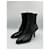 Botas de cano curto em couro preto de bico fino Prada  - vista 5