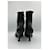 Botas de cano curto em couro preto de bico fino Prada  - vista 8