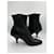Botas de cano curto em couro preto de bico fino Prada  - vista 9