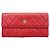 Cartera larga Chanel de piel de becerro granulada roja