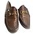 Mocassini Gucci in pelle marrone effetto coccodrillo con morsetto oro